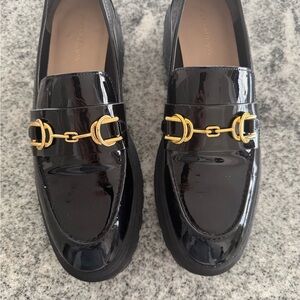 Stuart Weitzman Black and Gold Patent Loafers